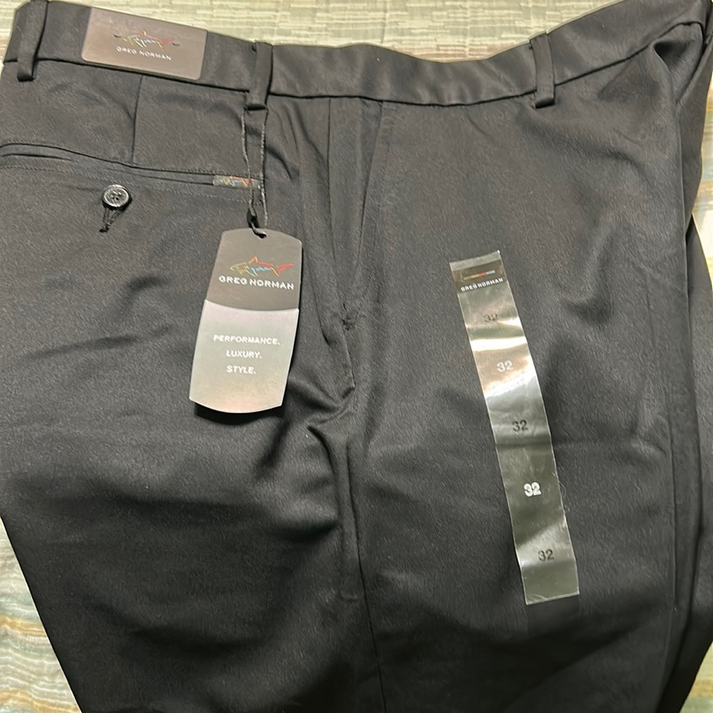 Brand new with tags. Greg Norman black shorts. Waist size 32